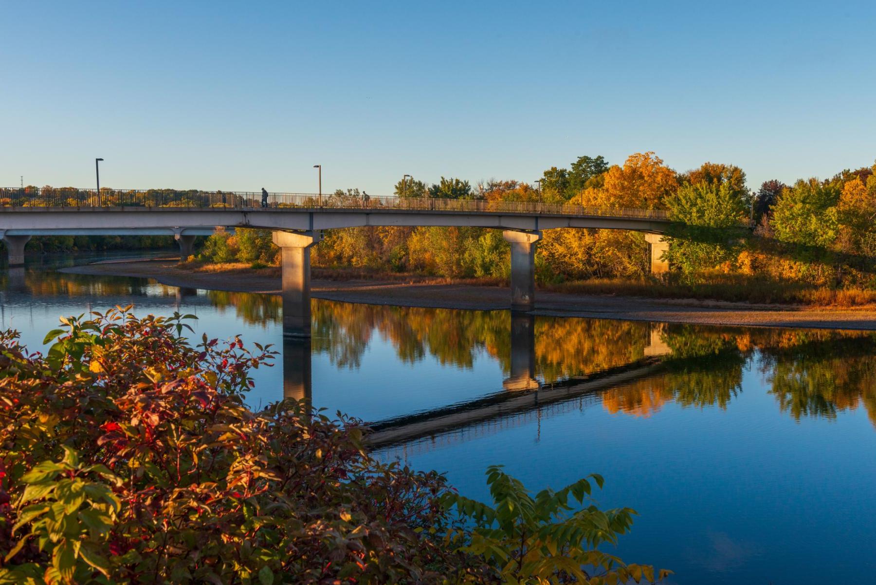 Fall campus scene with footbridge